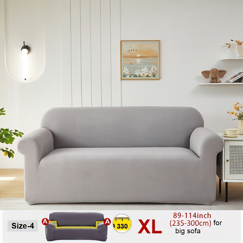 Housse de canapé extensible en velours côtelé jacquard, détail de la finition