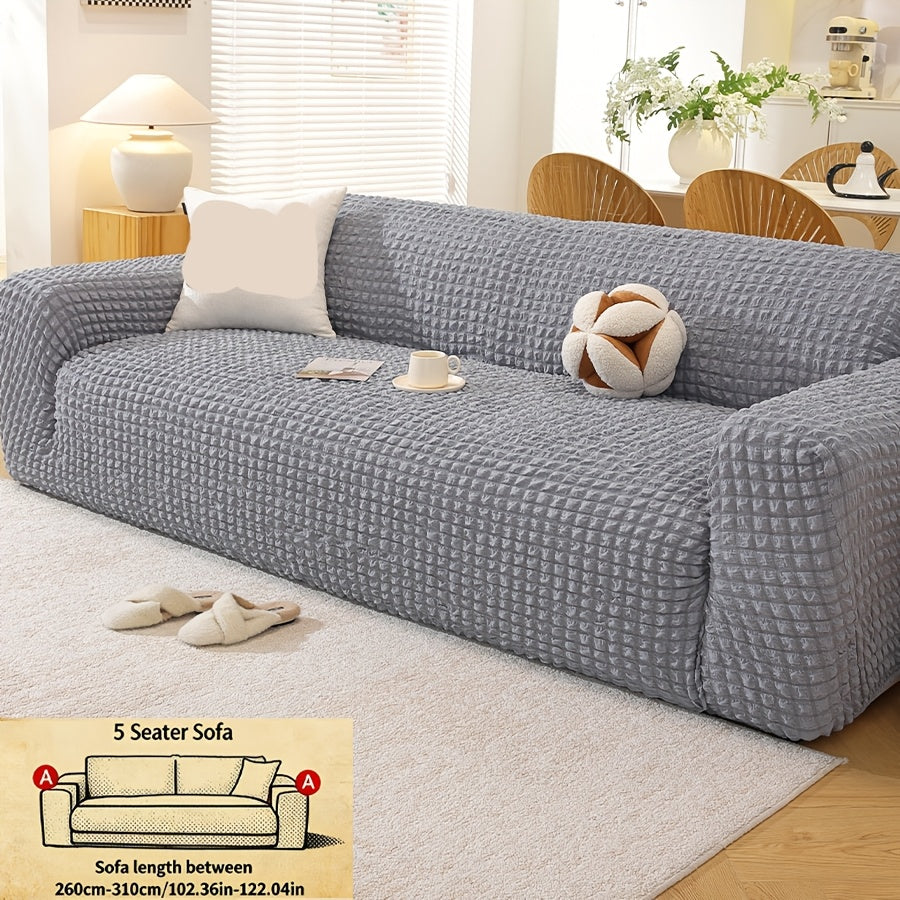 Housse de canapé épaisse extensible en polyester, gros plan sur le tissu
