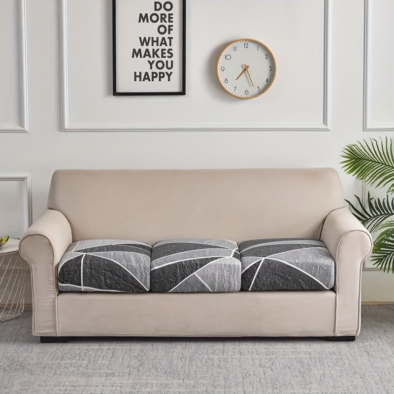 Housse de canapé extensible en fibre de lait à motif géométrique pour canapé, détail de l'ourlet