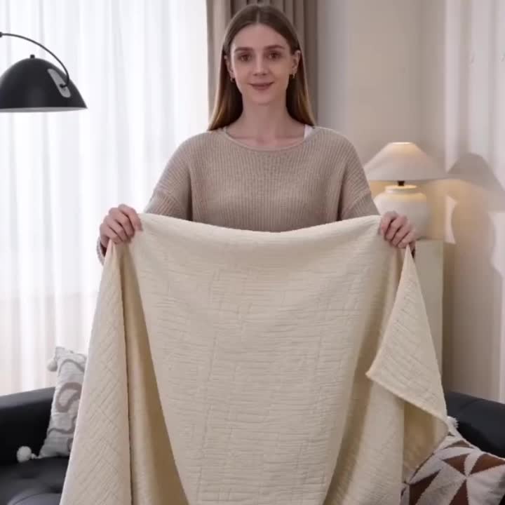 Housse de canapé extensible en polaire jacquard à motif géométrique, vue d'ensemble