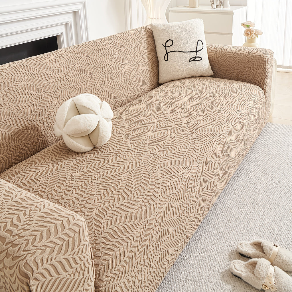 Housse de canapé extensible en polaire jacquard à motif feuillage, détail de la finition
