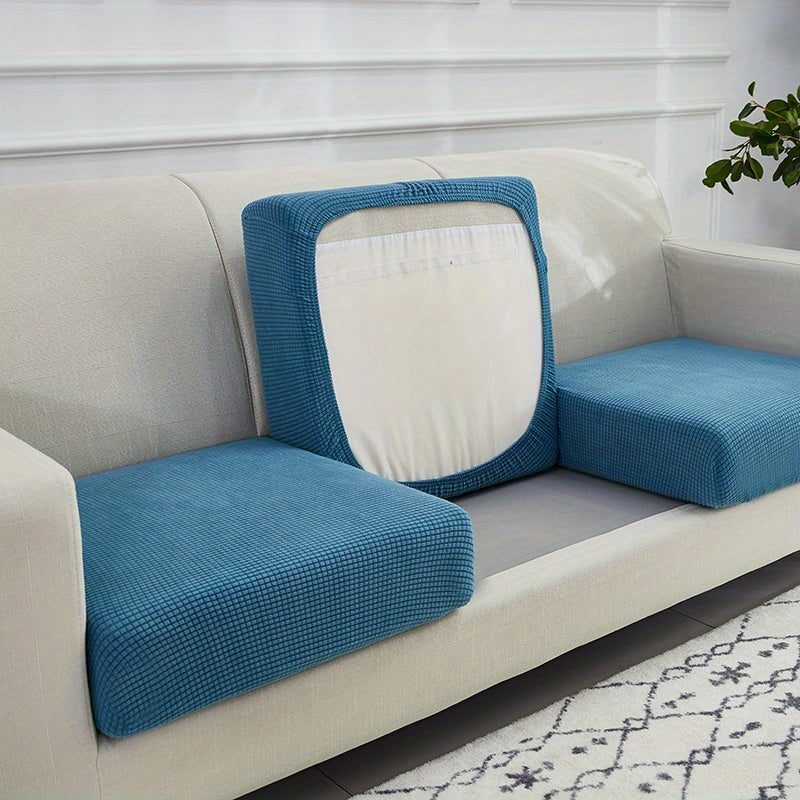 Housse de coussin extensible en polaire matelassée, détail de l'ourlet