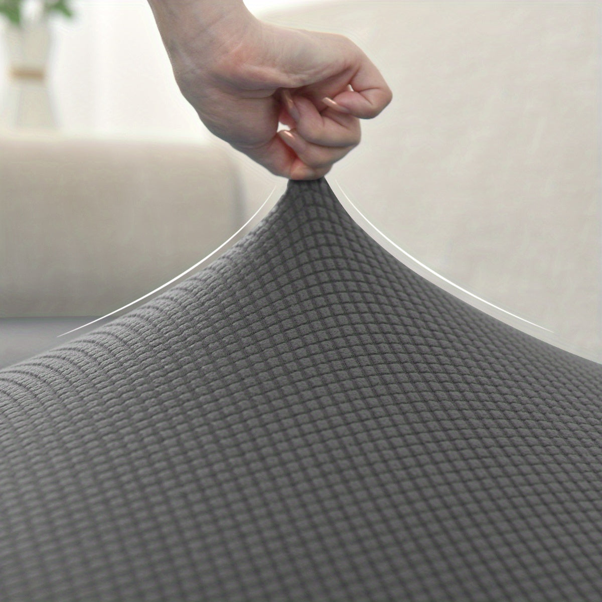 Housse de coussin extensible en polyester, détail de l'ourlet