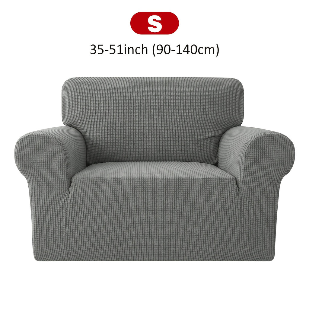 Housse de canapé extensible en velours côtelé jacquard à maille gaufrée, détail de l'ourlet