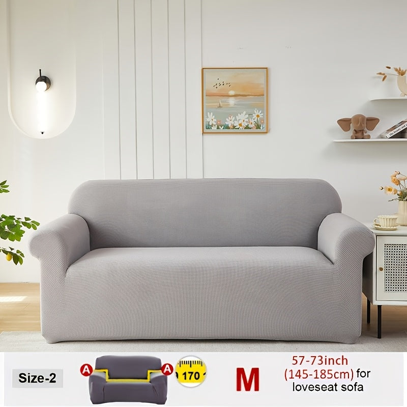 Housse de canapé extensible en velours côtelé jacquard, gros plan sur le tissu