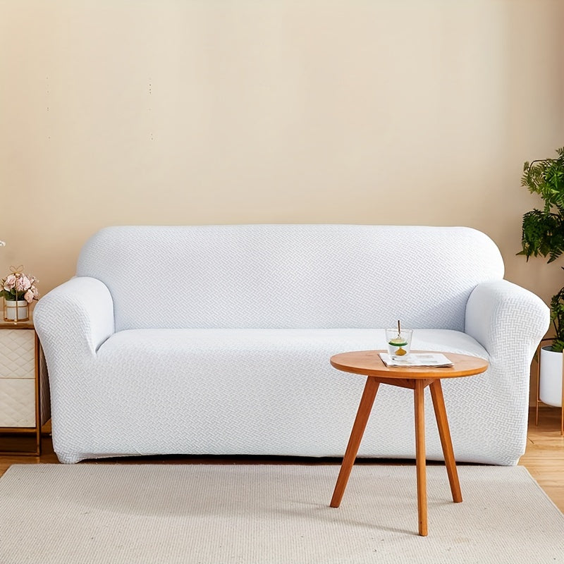 Housse de canapé extensible en polaire matelassée antidérapante, détail de l'ourlet