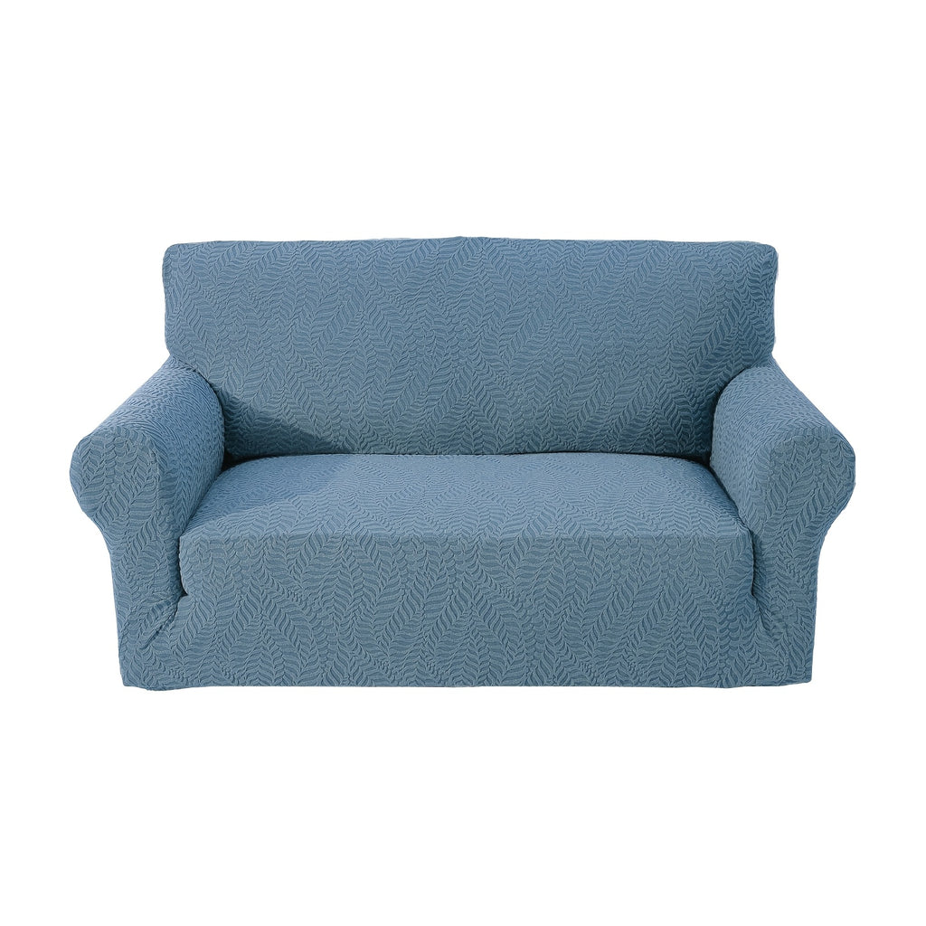Housse de canapé extensible en polaire jacquard antidérapante au rendu glamour, gros plan sur le tissu