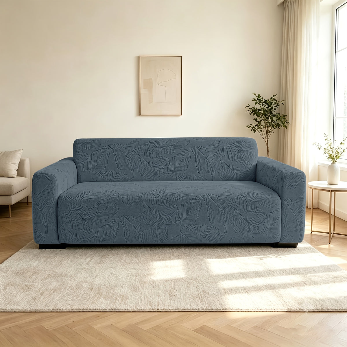 Housse de canapé extensible en polaire jacquard à motif feuillage, mise en situation