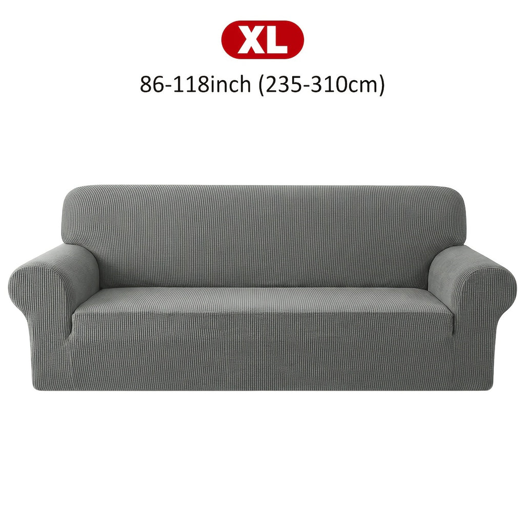 Housse de canapé extensible en velours côtelé jacquard à maille gaufrée, gros plan sur le tissu