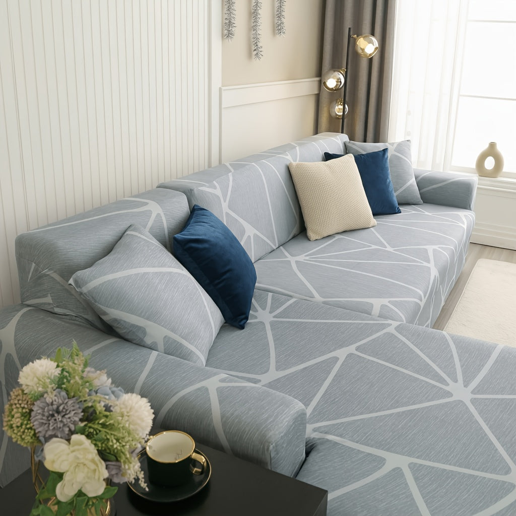 Housse de canapé en velours pour canapé trois places au rendu glamour, gros plan sur le tissu