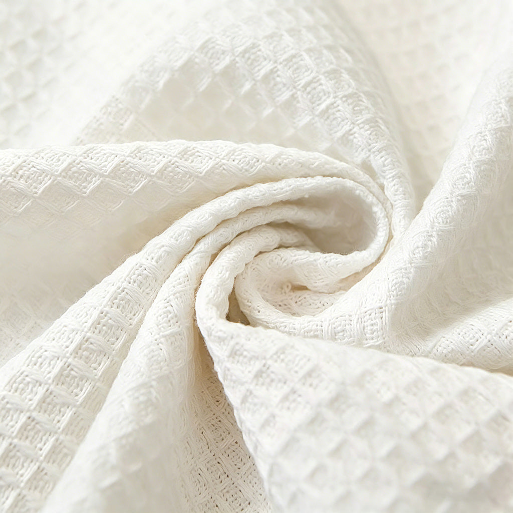Housse de canapé épaisse en polyester imprimée à motif fleuri antidérapante, détail de la finition
