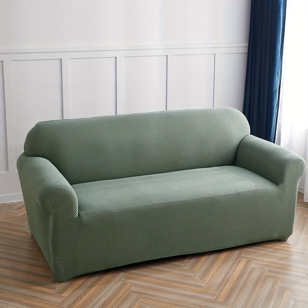 Housse de canapé extensible en polaire matelassée antidérapante, gros plan sur le tissu
