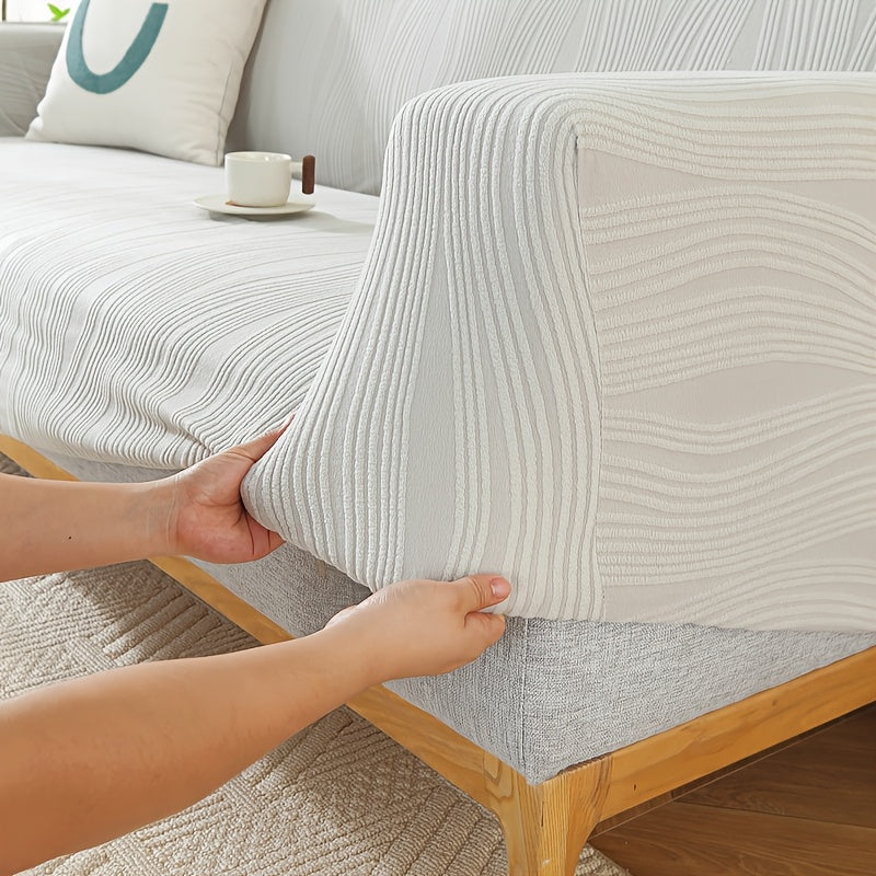 Housse de canapé extensible en polaire au rendu glamour, gros plan sur le tissu