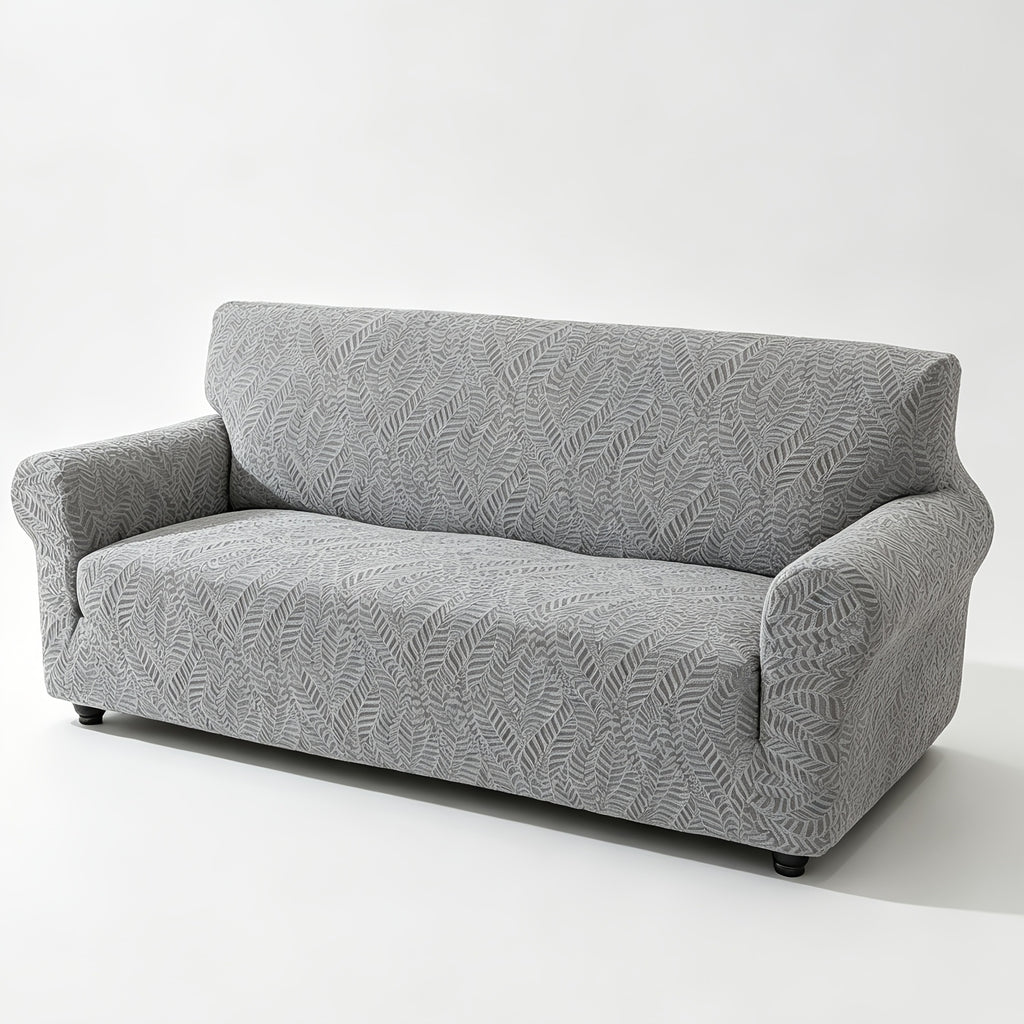 Housse de canapé extensible en polaire jacquard à motif feuillage anti-griffes, gros plan sur le tissu