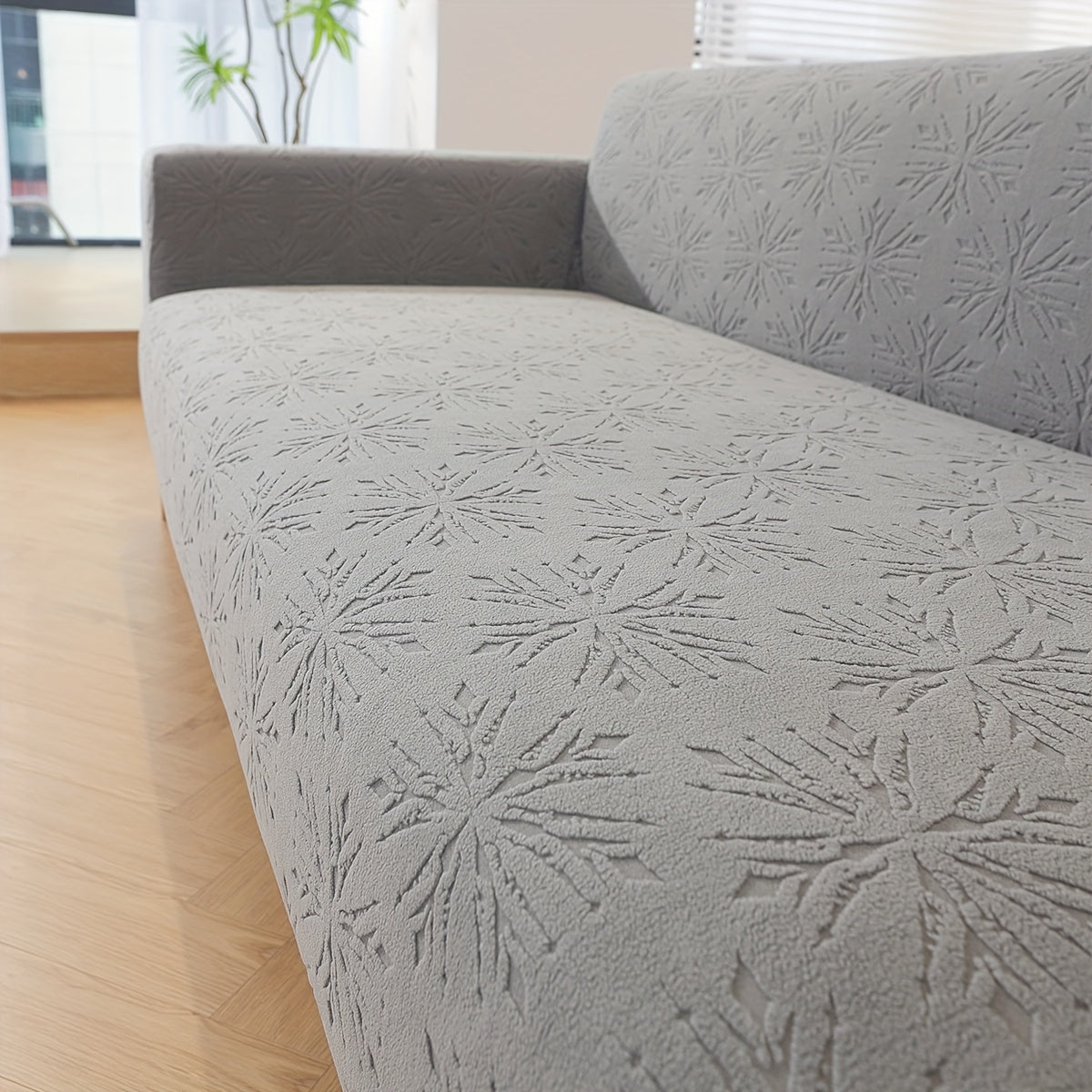 Housse de canapé épaisse extensible en polaire jacquard, détail de l'ourlet