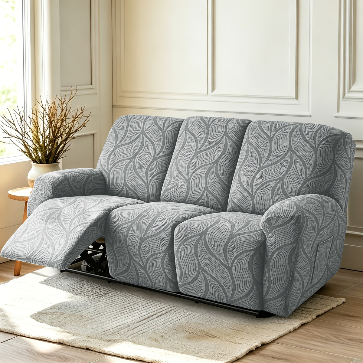 Housse de canapé extensible en polaire jacquard à motif feuillage, gros plan sur le tissu