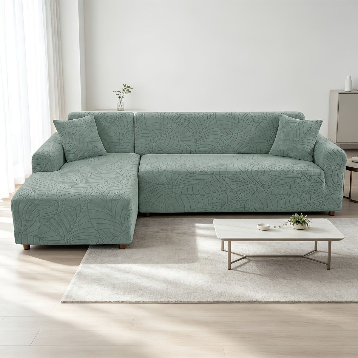 Housse de canapé extensible en polaire jacquard à motif feuillage, mise en situation