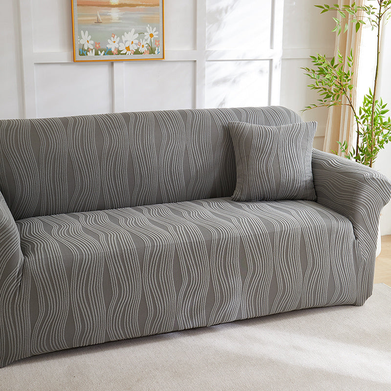 Housse de canapé extensible en polaire au rendu glamour