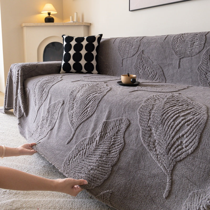 Housse de canapé en velours jacquard à motif feuillage, gros plan sur le tissu