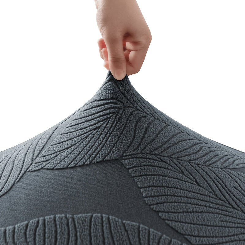 Housse de canapé extensible en polaire jacquard à motif feuillage au rendu, mise en situation