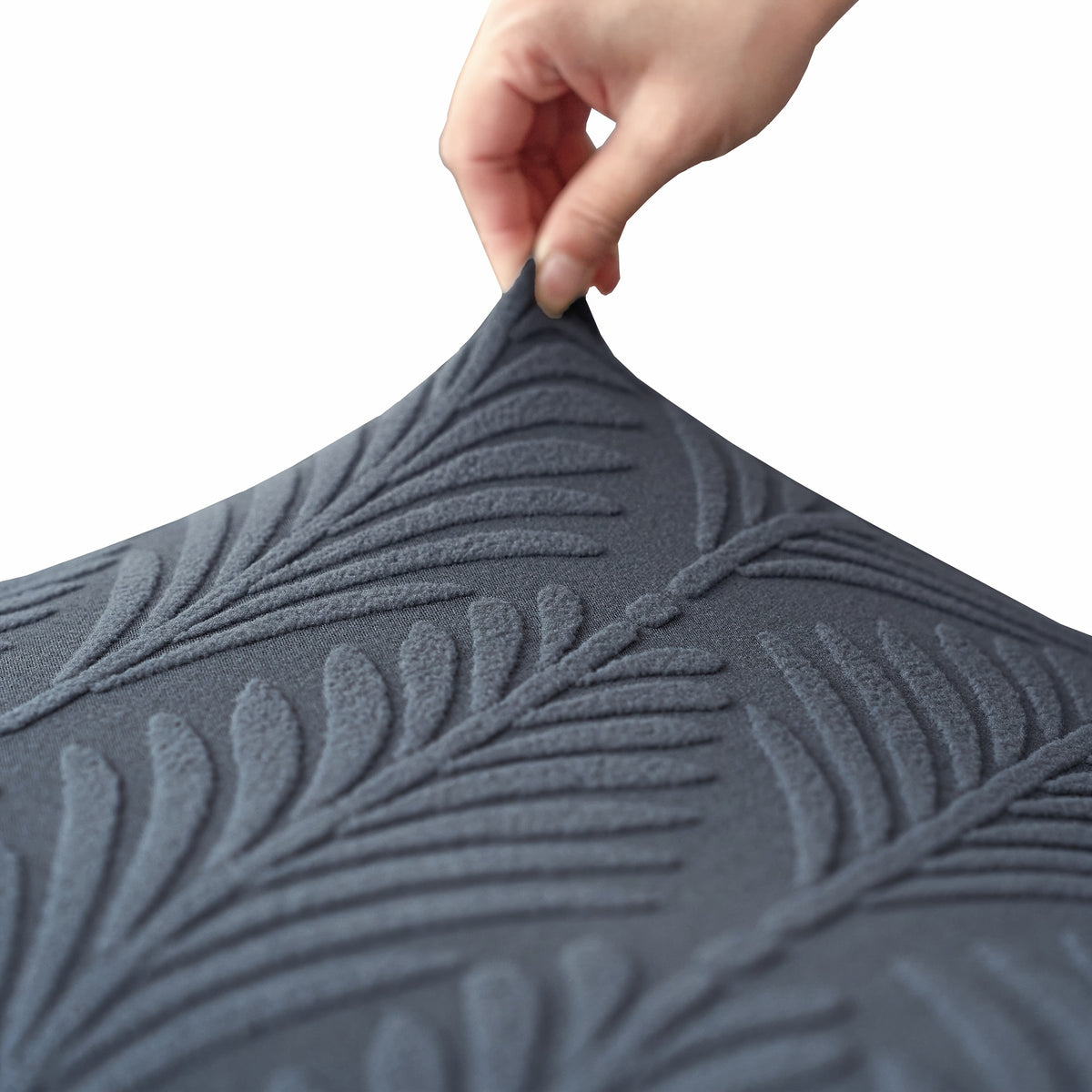 Housse de canapé extensible en polaire jacquard pour fauteuil, détail de la finition
