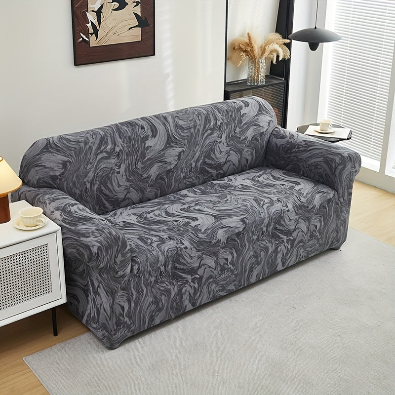Housse de canapé extensible en fibre de lait matelassée à motif tropical, gros plan sur le tissu