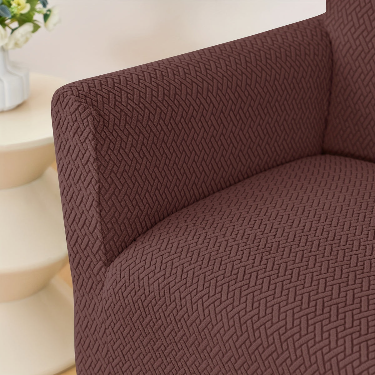 Housse de fauteuil extensible en polaire jacquard pour fauteuil, détail de l'ourlet
