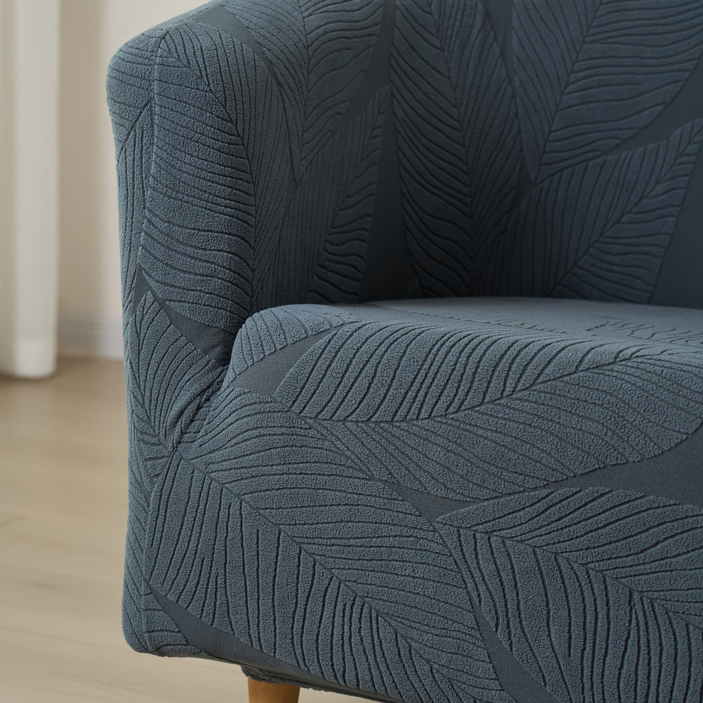 Housse de canapé extensible en polaire jacquard à motif feuillage, détail de la finition