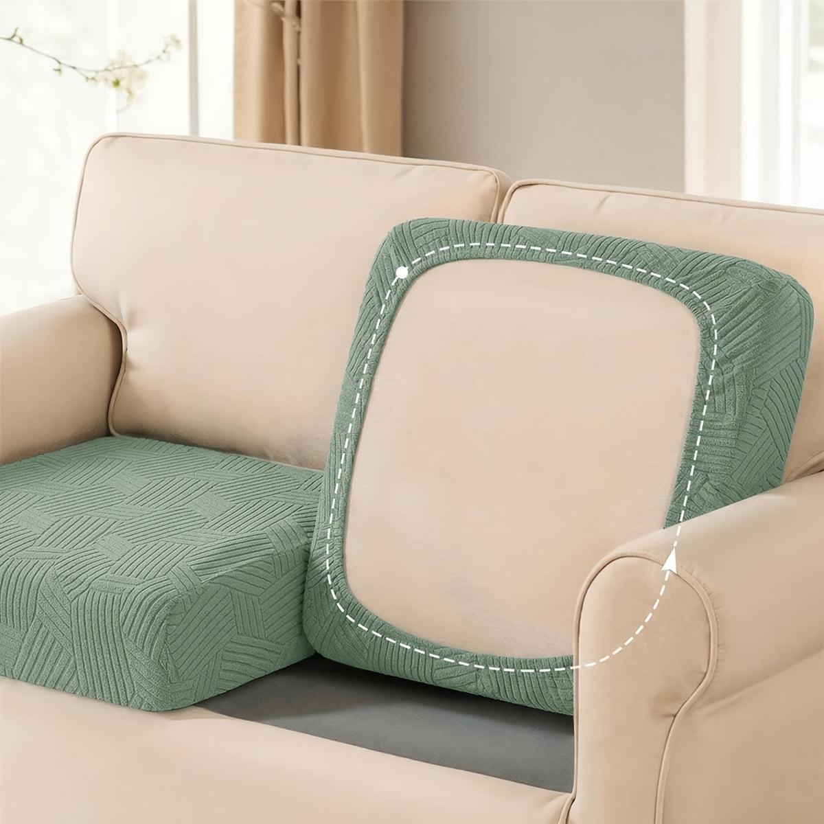 Housse de canapé extensible en polaire jacquard à motif géométrique, détail de l'ourlet