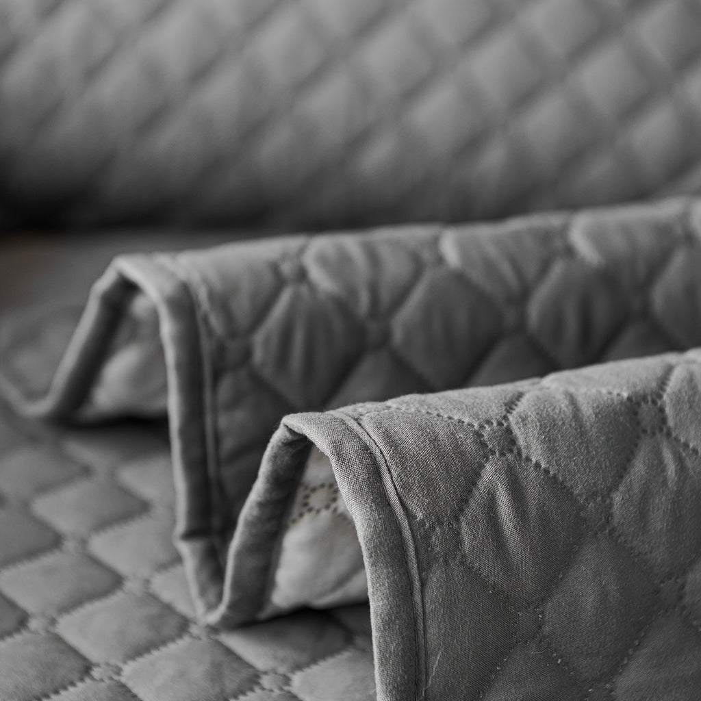 Housse de canapé légère en polyester antidérapante, gros plan sur le tissu