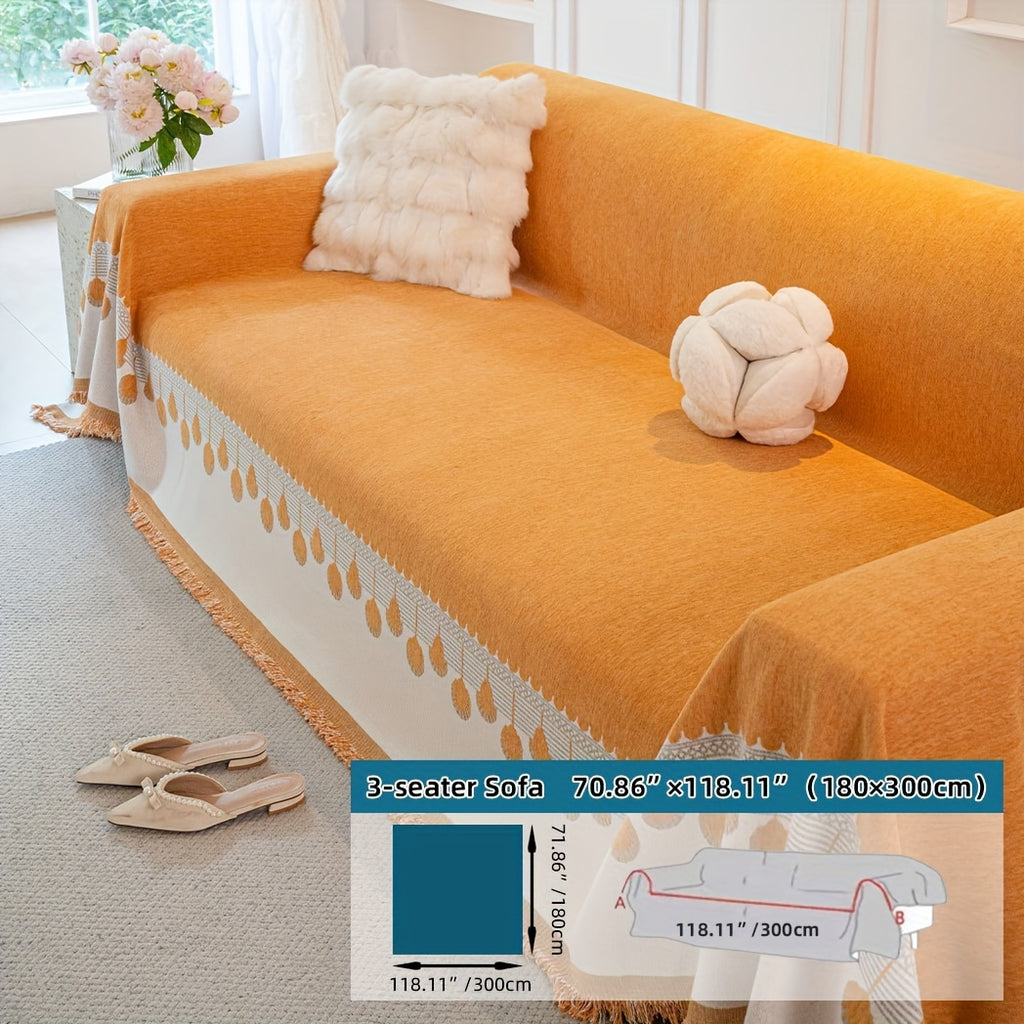 Housse de canapé en chenille jacquard à volants d'esprit bohème, gros plan sur le tissu