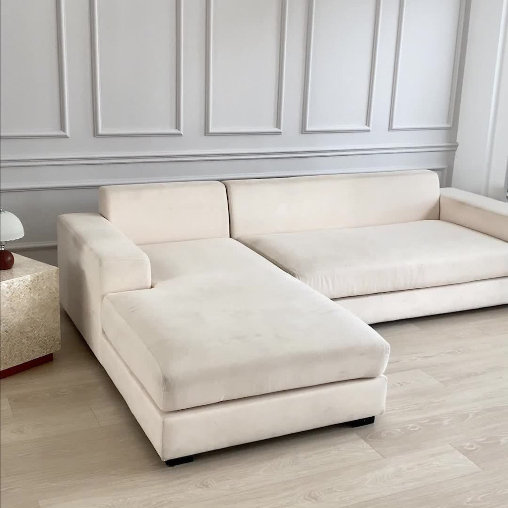 Housse de canapé légère extensible en fibre de lait pour canapé d'angle, mise en situation