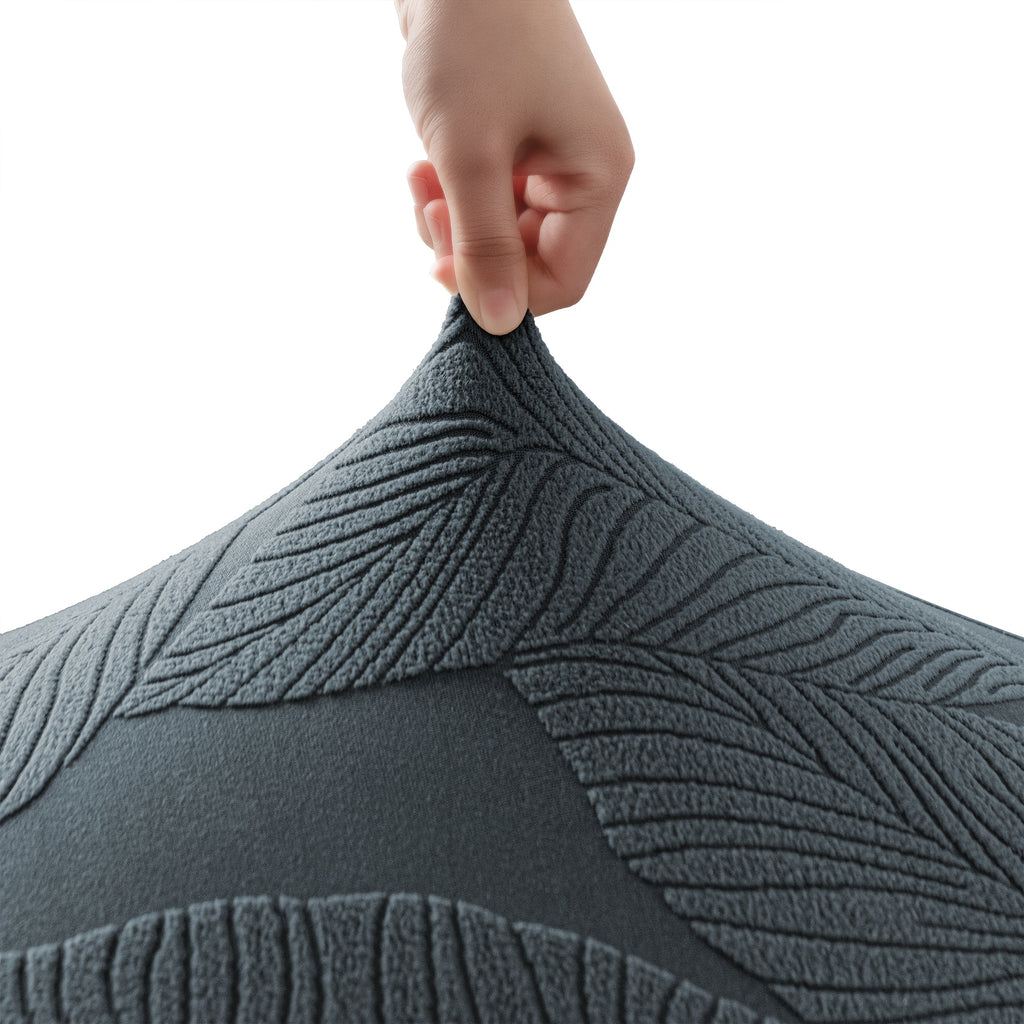Housse de canapé extensible en polaire jacquard pour fauteuil, détail de l'ourlet