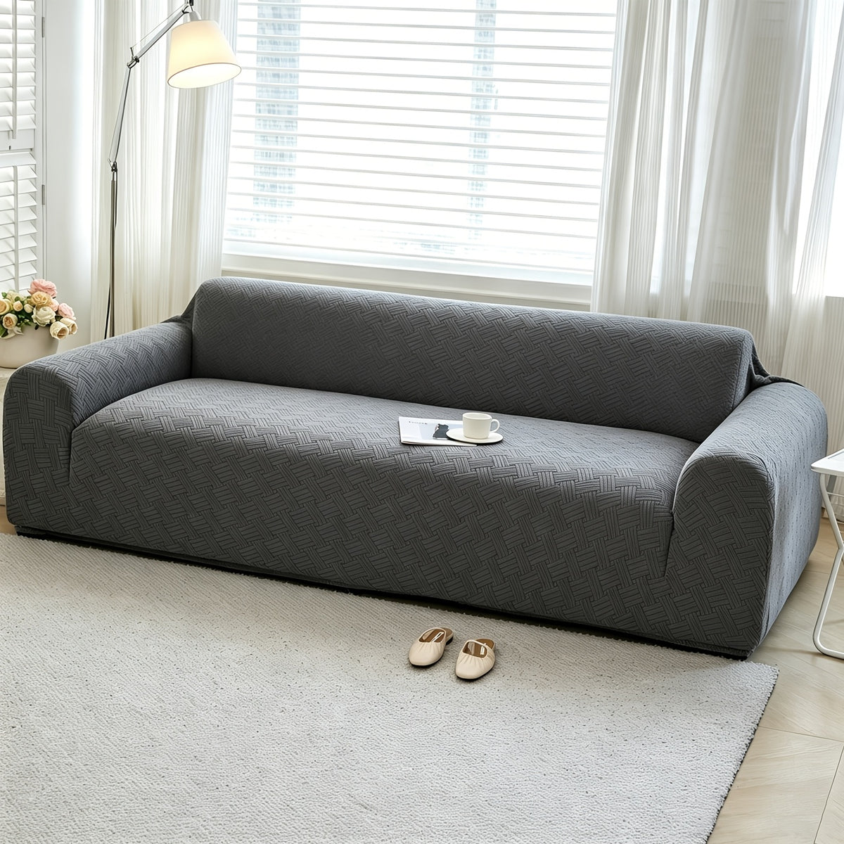 Housse de canapé extensible en polaire jacquard à rayures Image