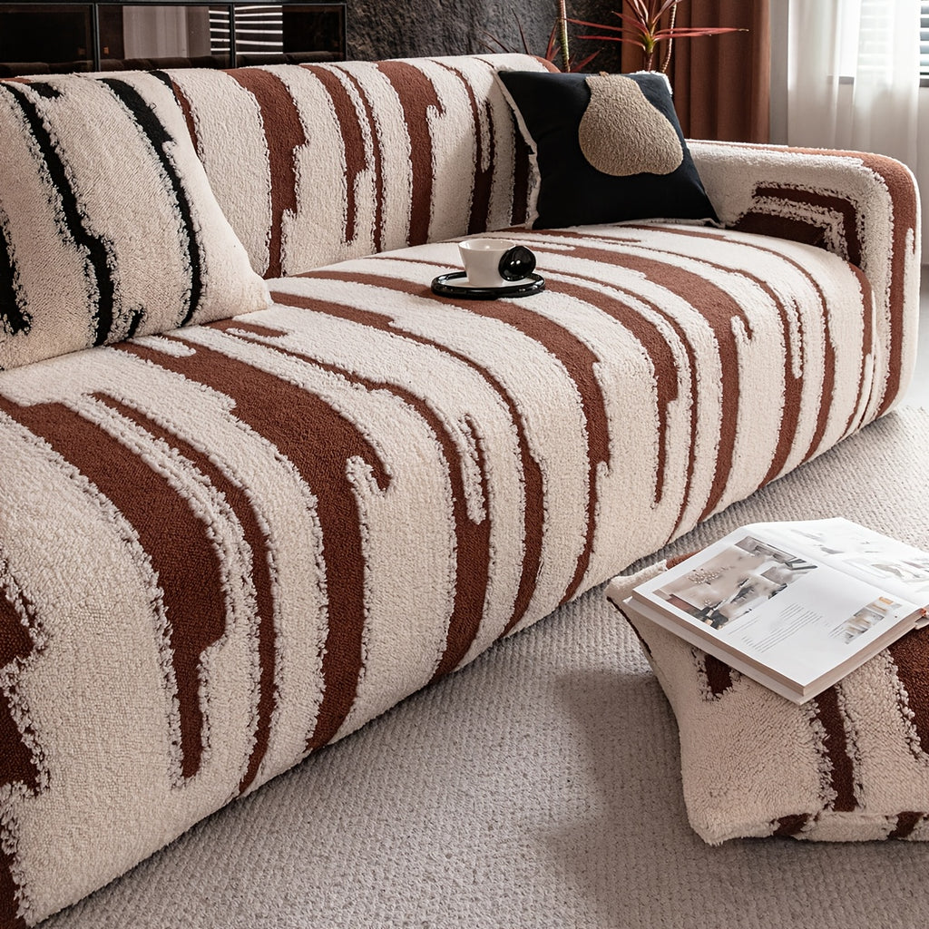 Housse de canapé en velours jacquard à motif géométrique d'esprit vintage, détail de l'ourlet