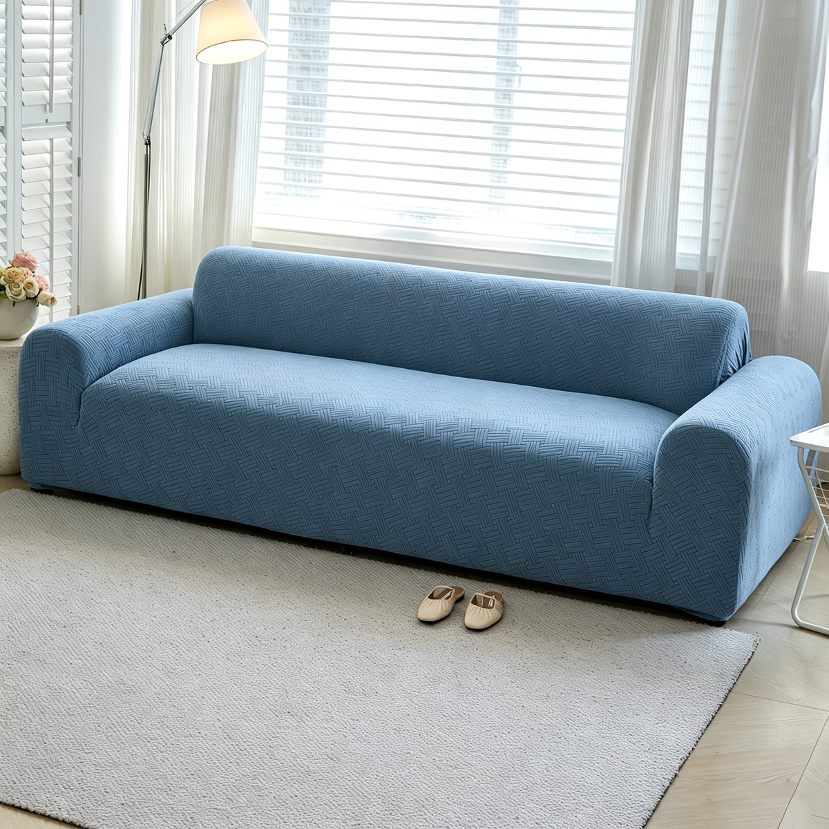 Housse de canapé extensible en polaire jacquard à rayures, vue d'ensemble
