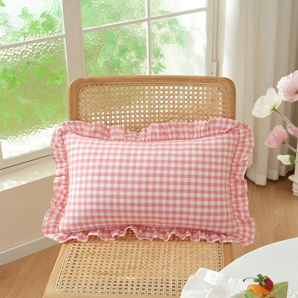 Housse de coussin en coton en fils teints, détail de l'ourlet