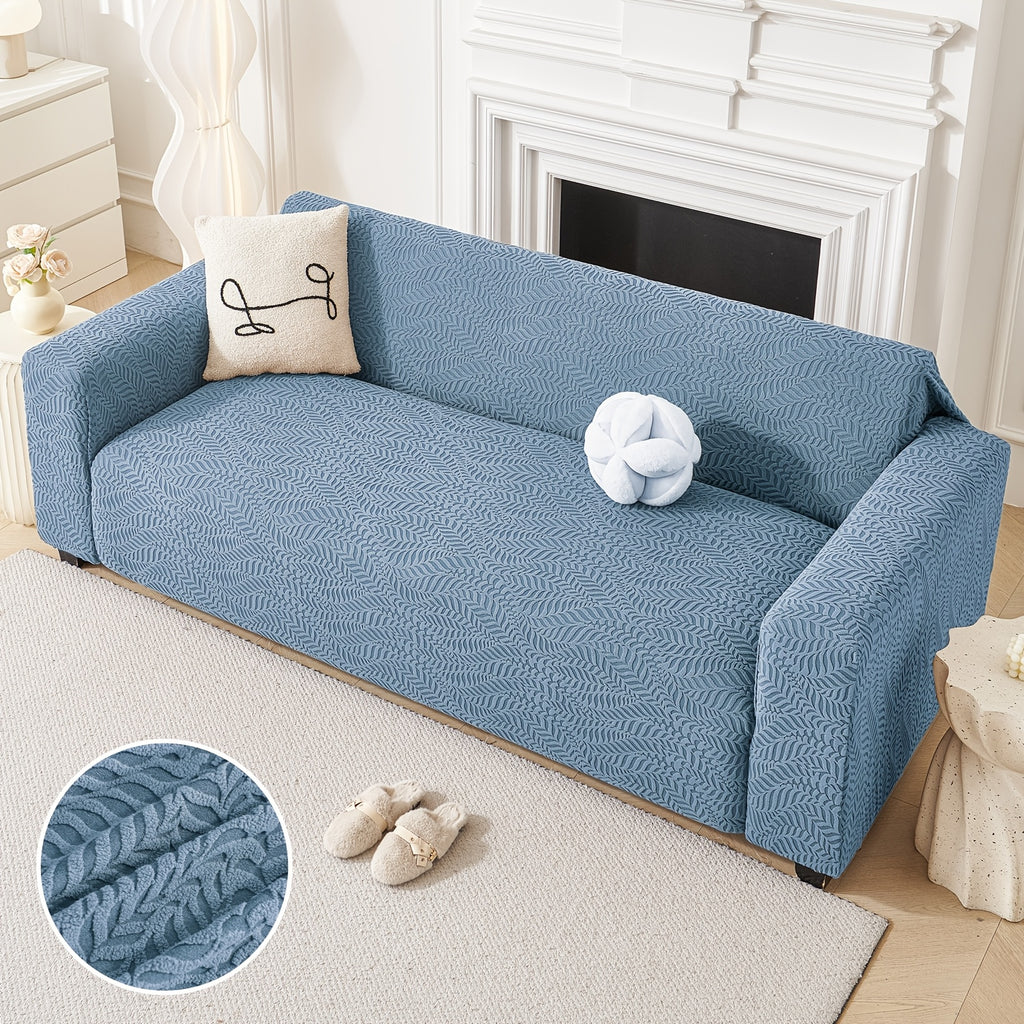 Housse de canapé extensible en polaire jacquard à motif feuillage, détail de la finition