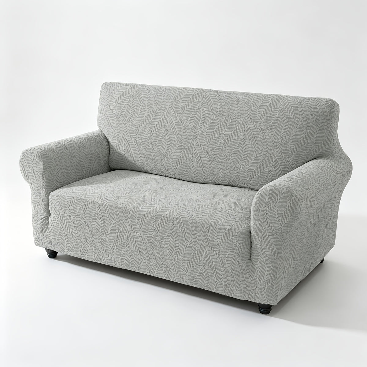 Housse de canapé extensible en polaire jacquard à motif feuillage anti-griffes, détail de la finition