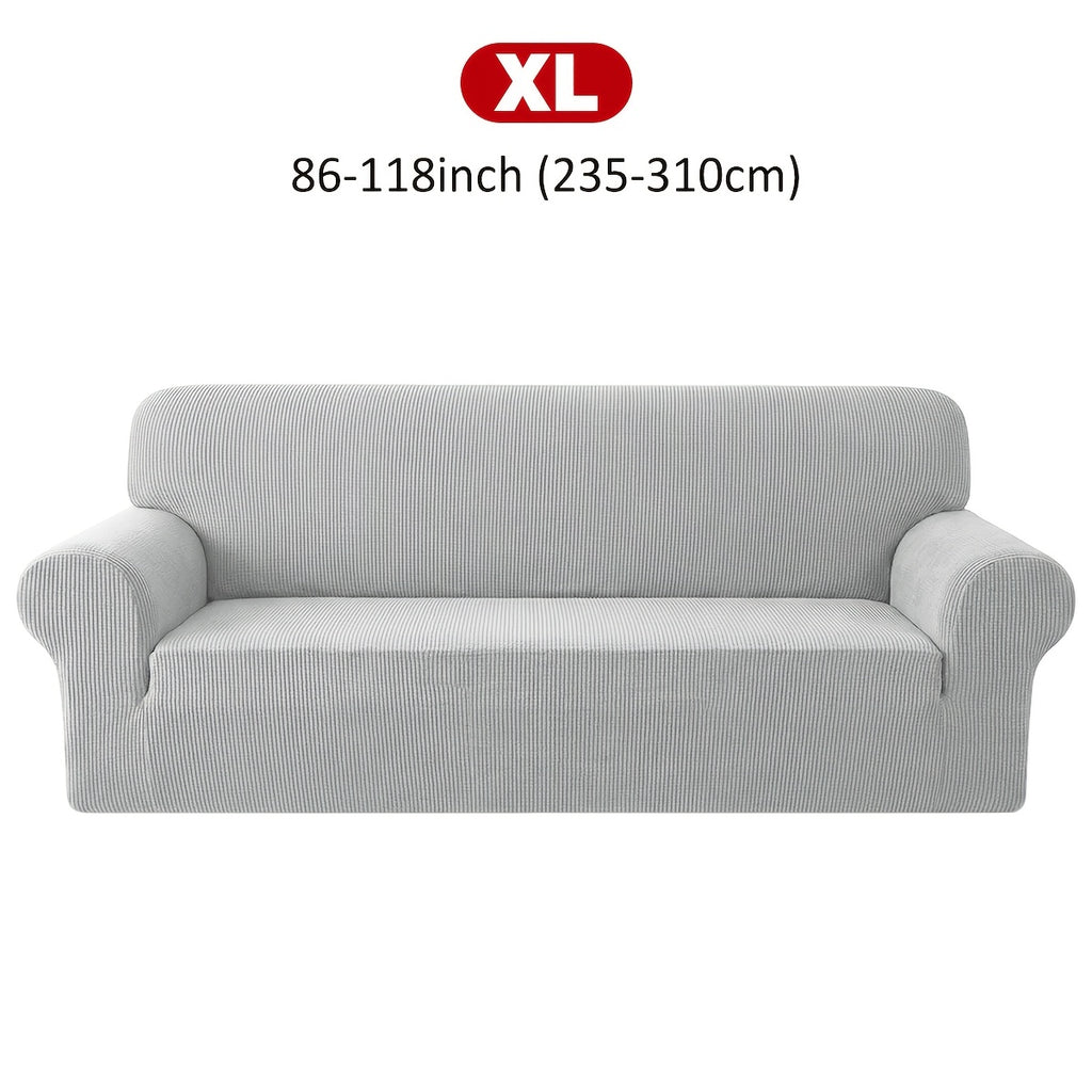 Housse de canapé extensible en velours côtelé jacquard à maille gaufrée, détail de l'ourlet