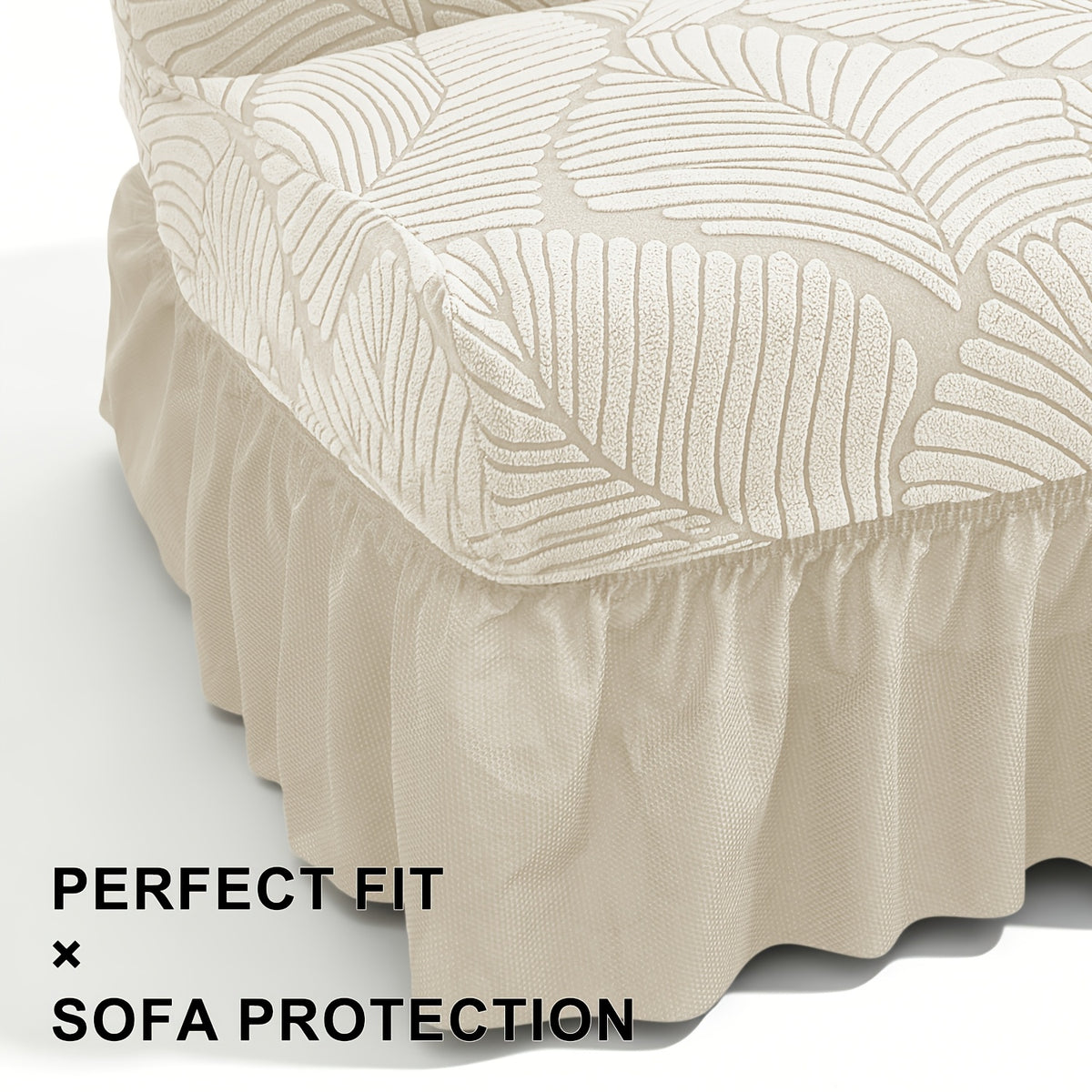 Housse de canapé extensible en jacquard à motif feuillage à volants, détail de l'ourlet