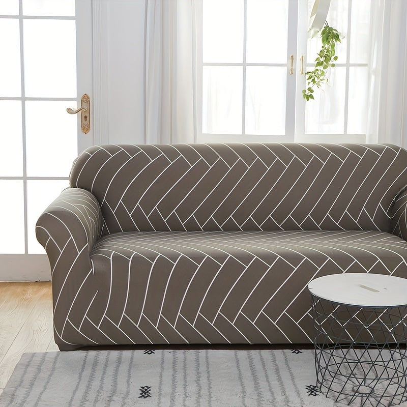Housse de canapé extensible en fibre de lait matelassée à motif tropical, détail de la finition