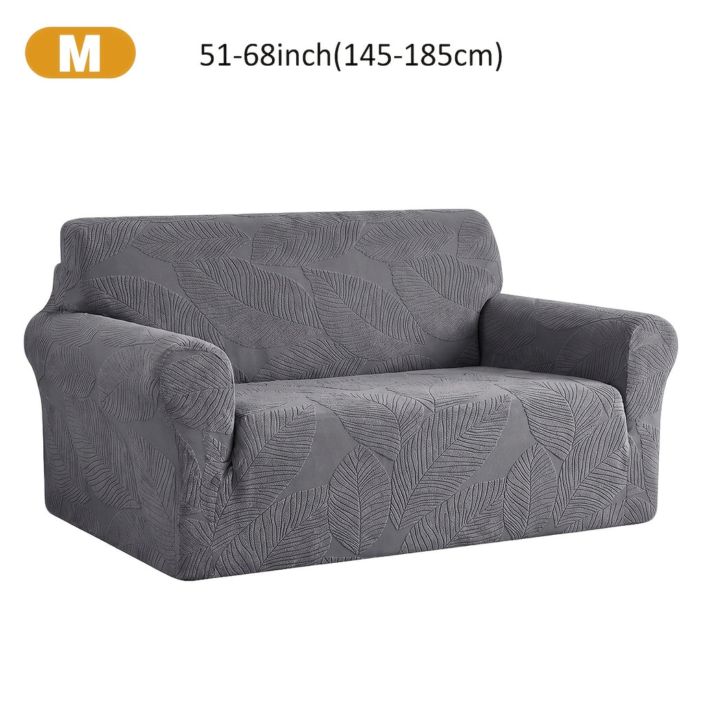 Housse de canapé extensible en polaire jacquard à motif feuillage, gros plan sur le tissu