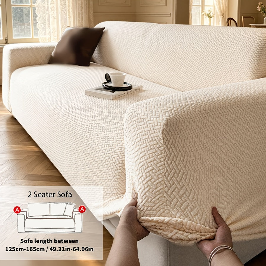 Housse de canapé extensible en polaire jacquard à carreaux, détail de l'ourlet