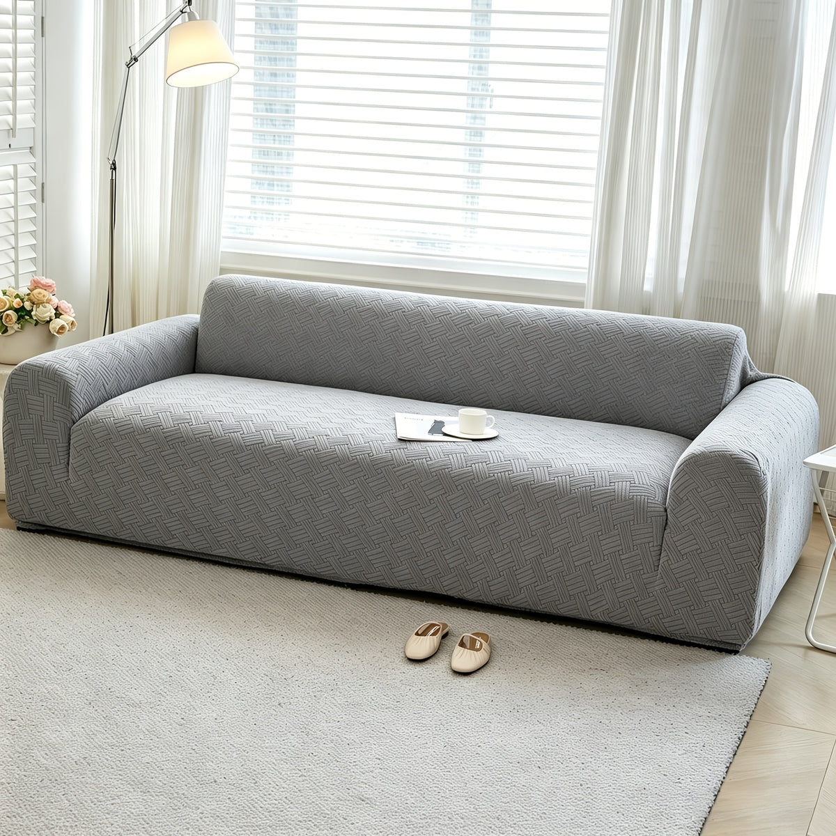 Housse de canapé extensible en polaire jacquard à rayures Image