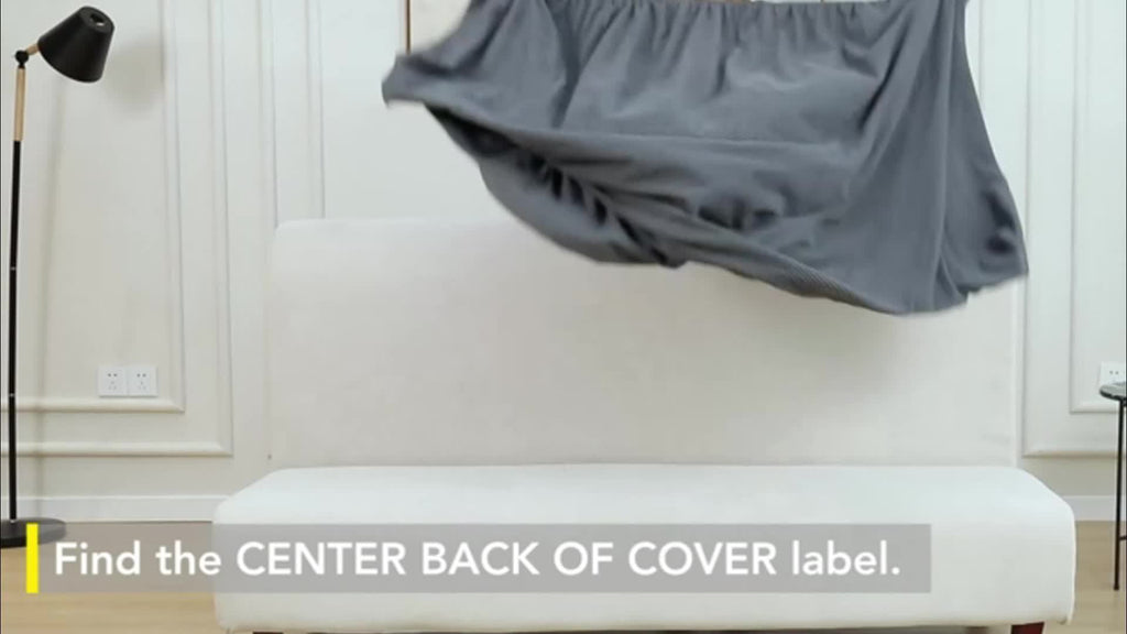 Housse de canapé extensible en polaire jacquard sans accoudoirs, détail de la finition