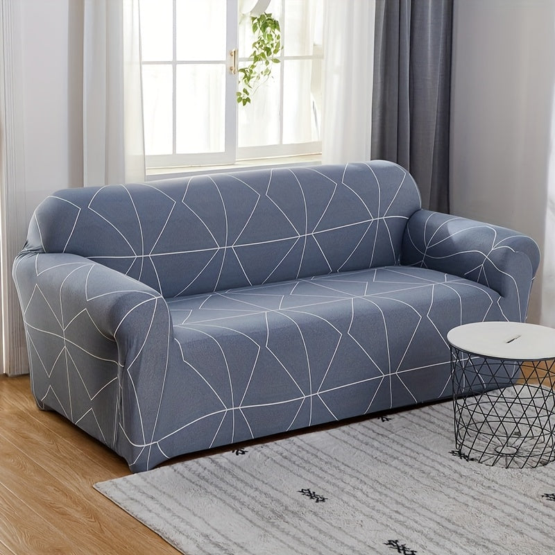 Housse de canapé extensible en fibre de lait matelassée à motif tropical, gros plan sur le tissu