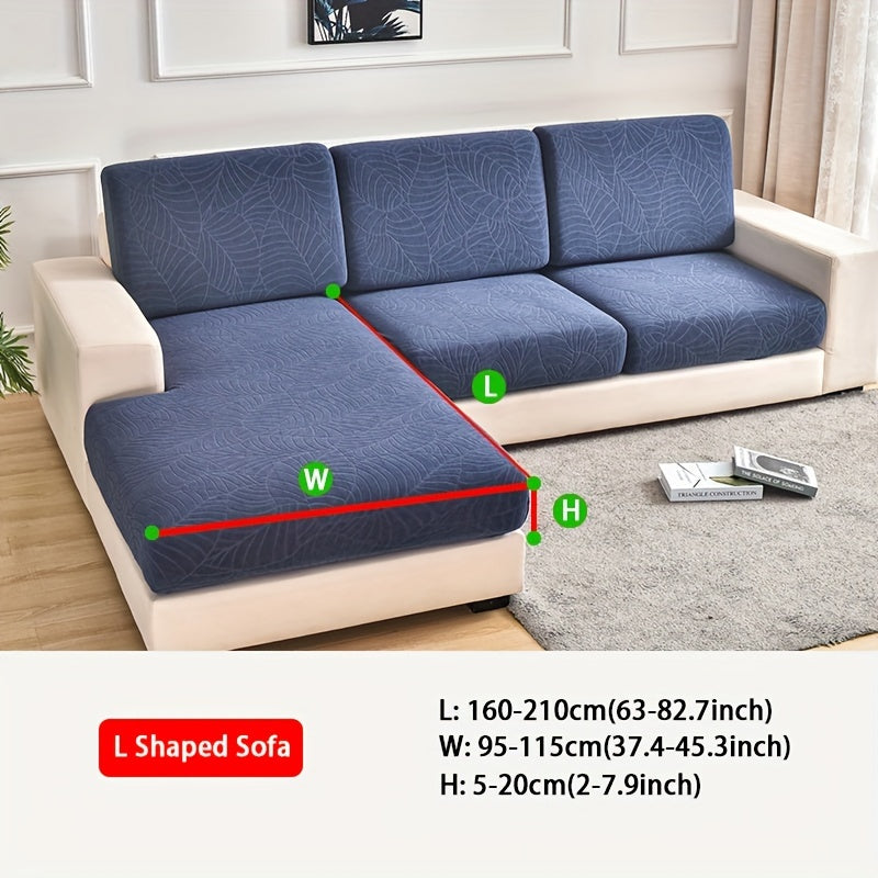 Housse de canapé épaisse extensible en polaire jacquard à motif feuillage, détail de l'ourlet