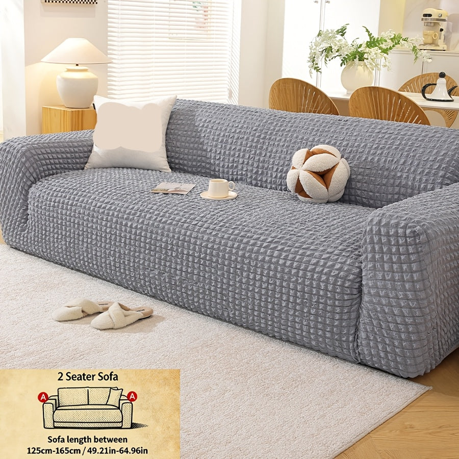 Housse de canapé épaisse extensible en polyester, détail de l'ourlet