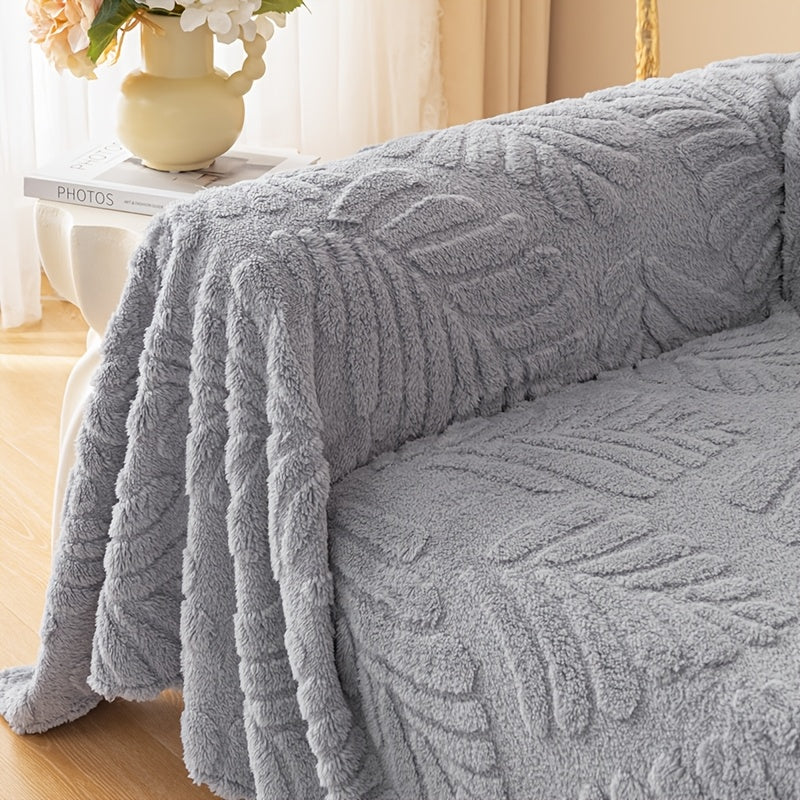 Housse de canapé en peluche à motif feuillage antidérapante, gros plan sur le tissu